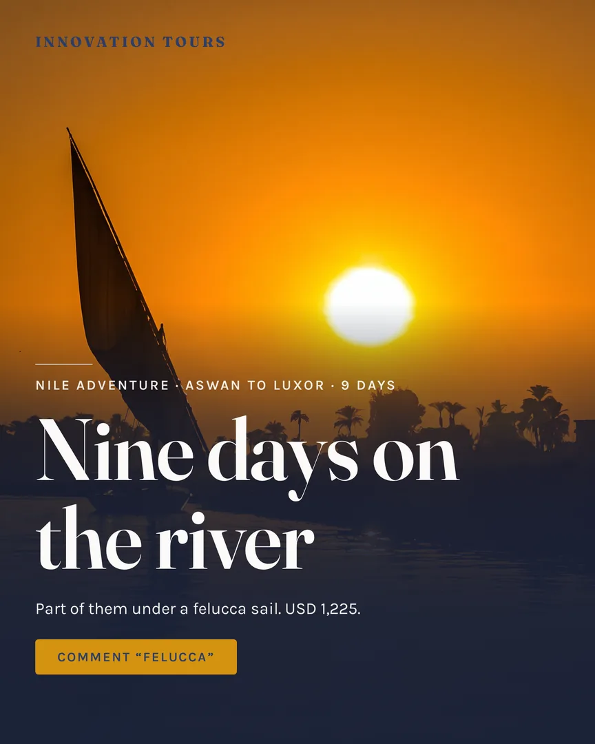 A felucca sailing on the Nile at sunset, its sail dark against an orange sky.