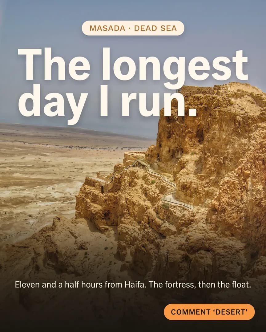 The clifftop ruins of Masada rising above the pale Judean desert plain.